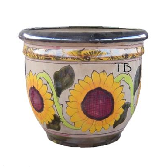Vibrant Mexican Talavera pottery planter, form our Earthy Delights: Product Menu adorned with intricate hand-painted patterns, adding cultural charm to your garden or interior decor